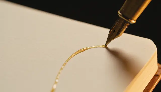 Fountain pen drawing a rising gold line